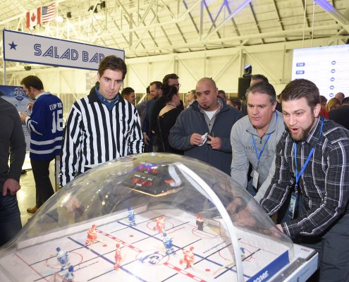 Dufferin Concrete Employees at the Bubble Hockey