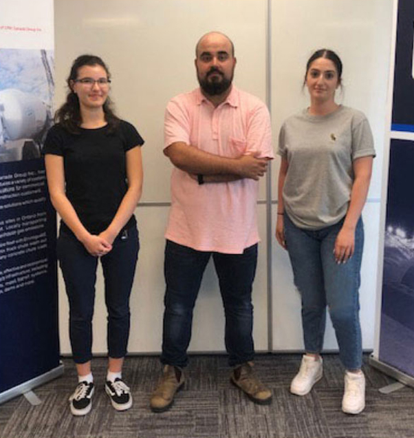 Photo of three new graduates working at Dufferin Concrete